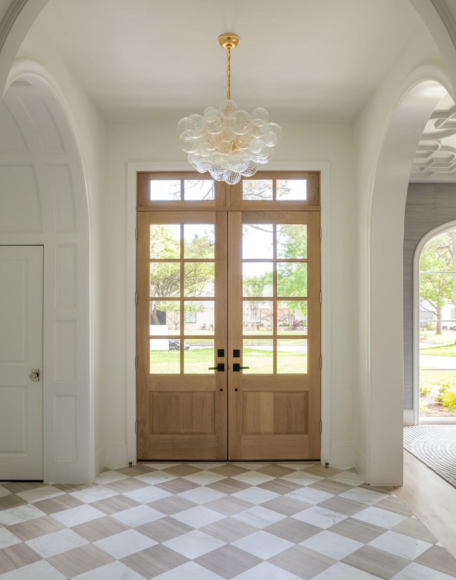 limestone checkerboard flooring tile in entryway