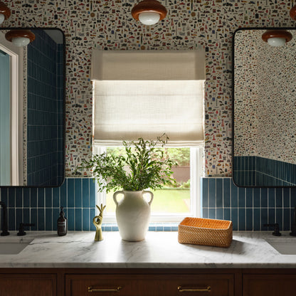 blue rectangle cement tile installed on the wall in a bathroom