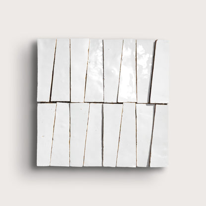 white zellige trapezoid design on a light gray background