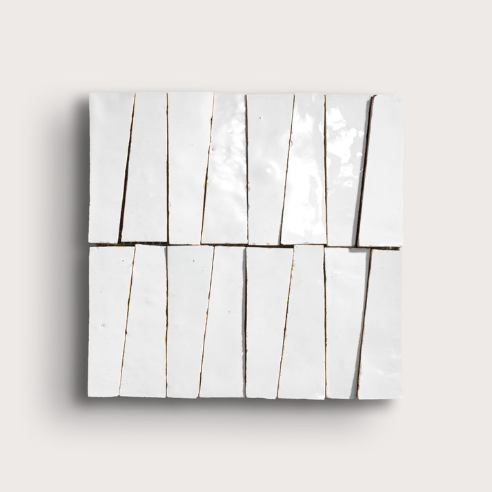white zellige trapezoid design on a light gray background