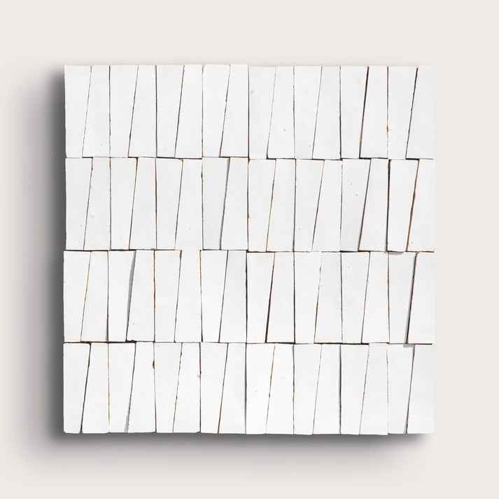 white zellige trapezoid design on a light gray background