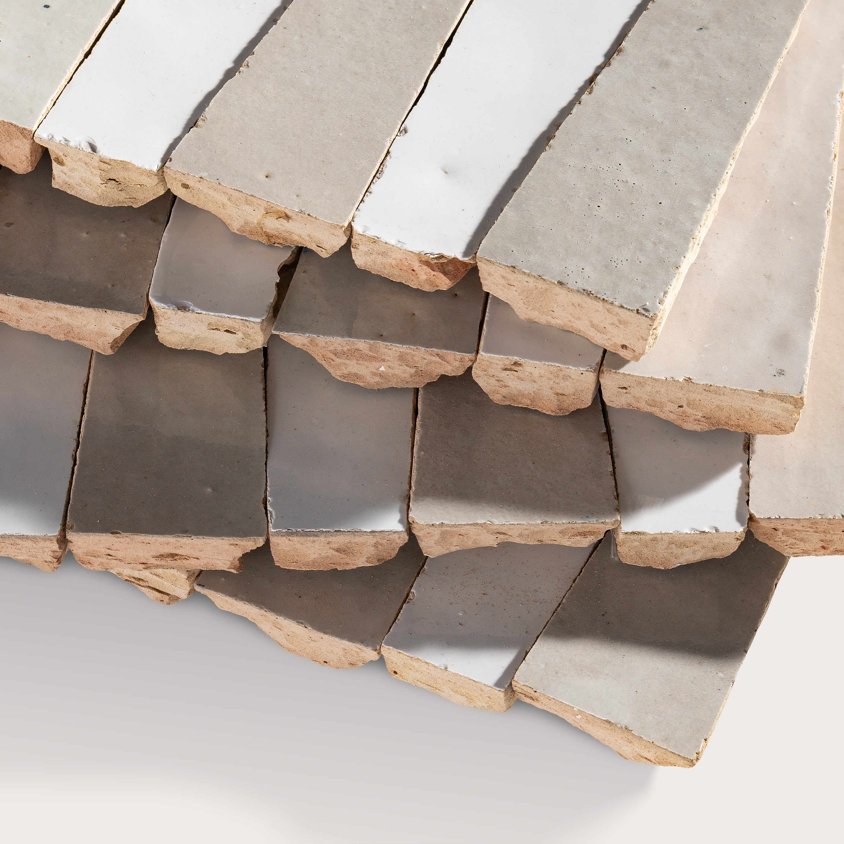 Bright White & Natural White 1x4 Trapezoid Mosaic Zellige Tile