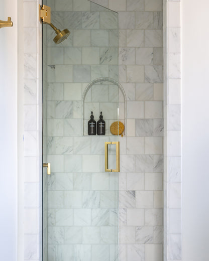 casablanca carrara square tile installed in shower