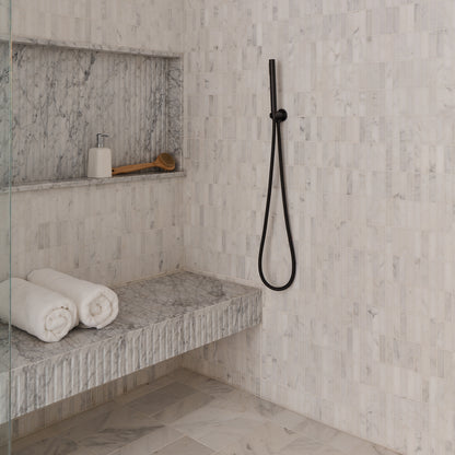 casablanca carrara rectangle stacked marble in shower