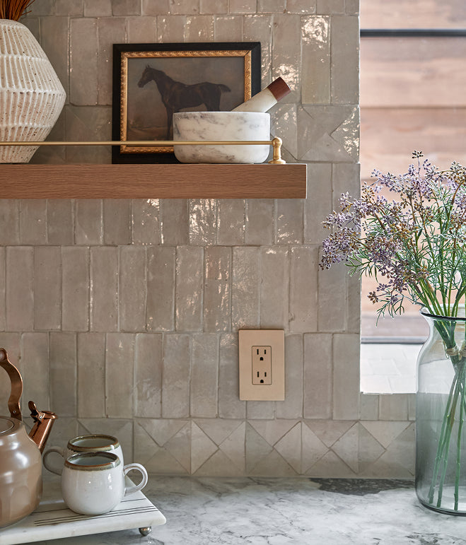 zellige tile backsplash in kitchen with open shelving and styled decor