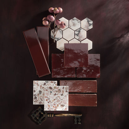 red color palette mood board with ceramic, marble, zellige, and terrazzo tile.