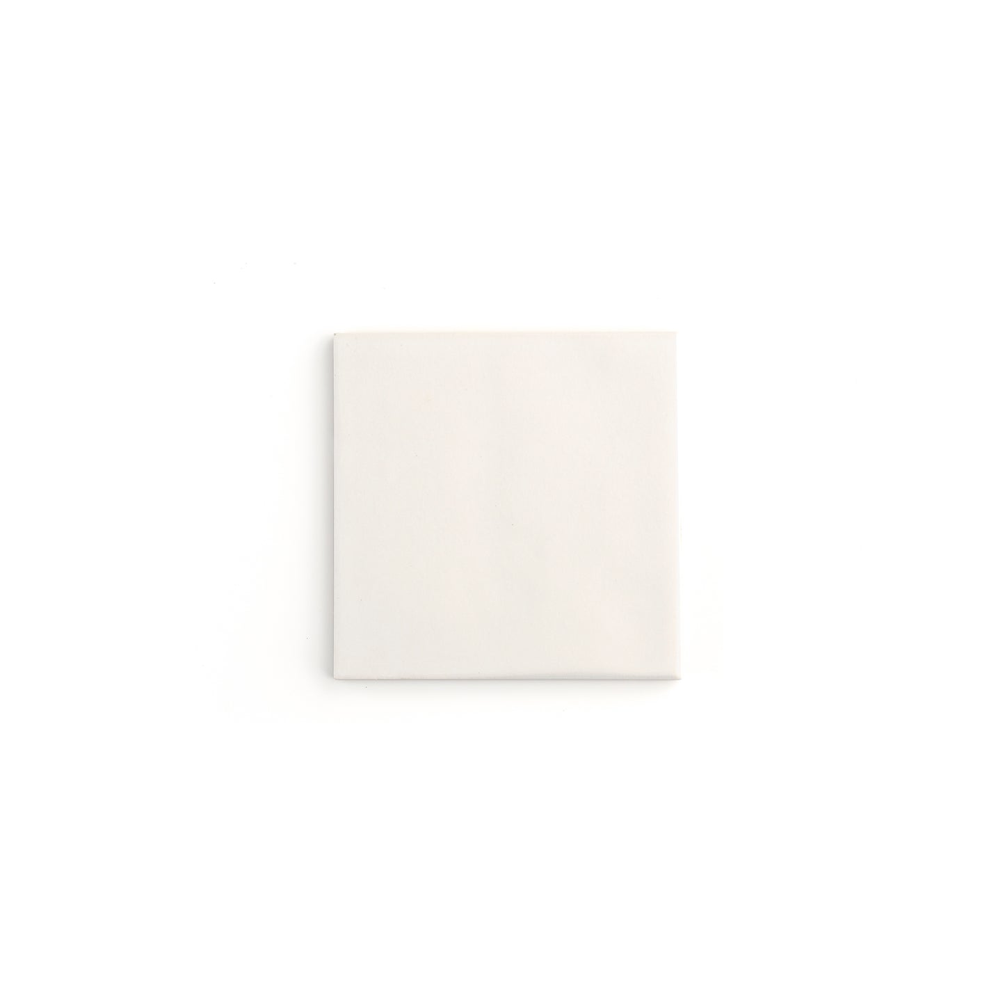 Glossy white ceramic tile in classic square design