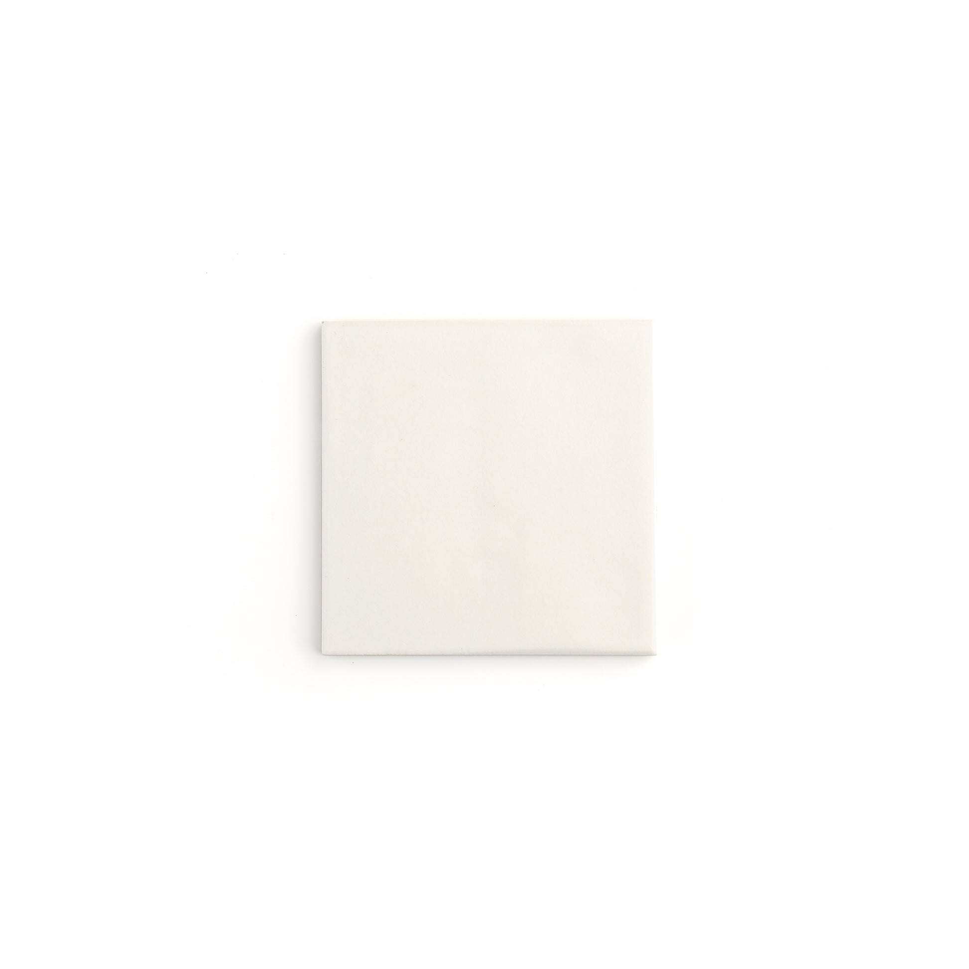 Glossy white ceramic tile in classic square design