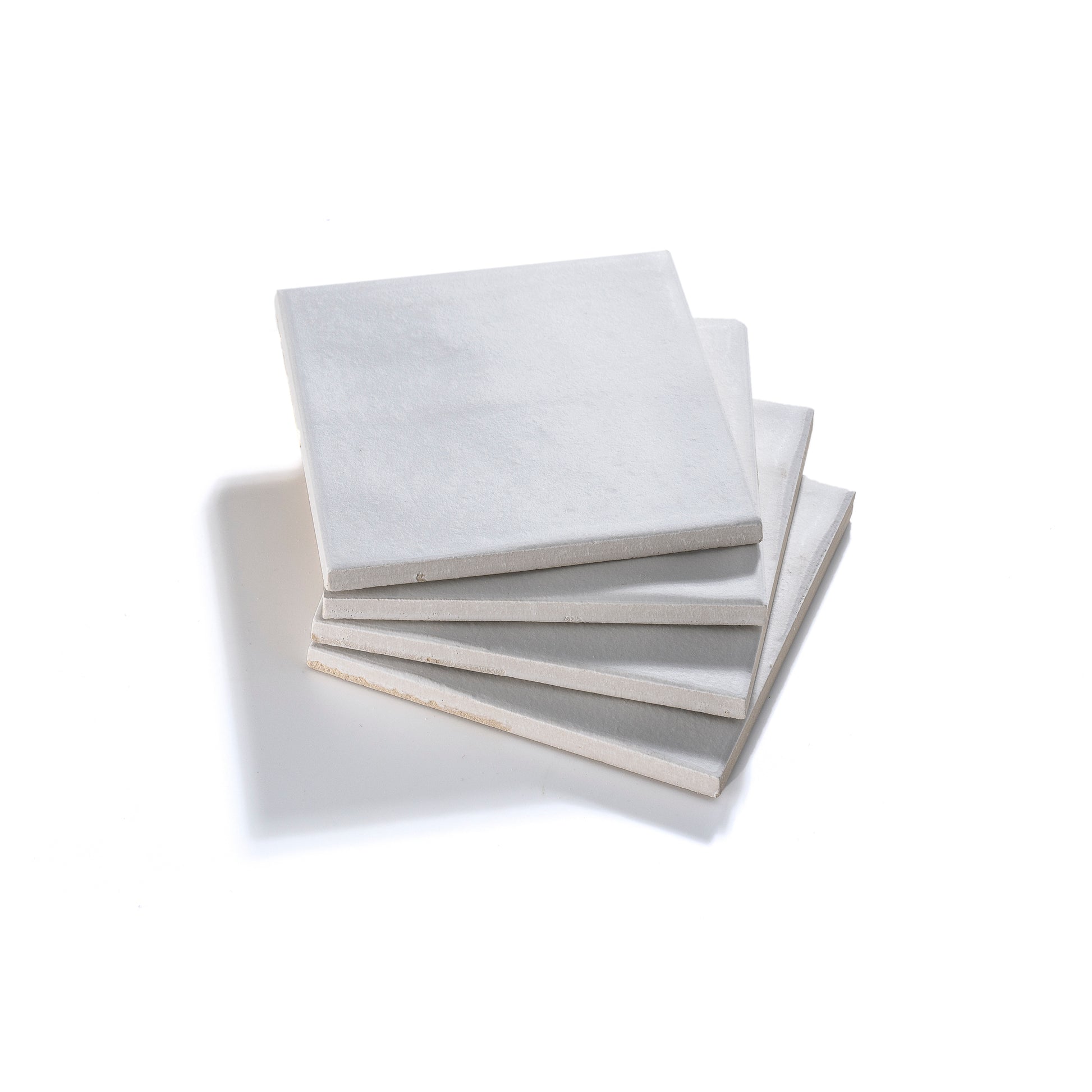 White ceramic floor tile with polished finish