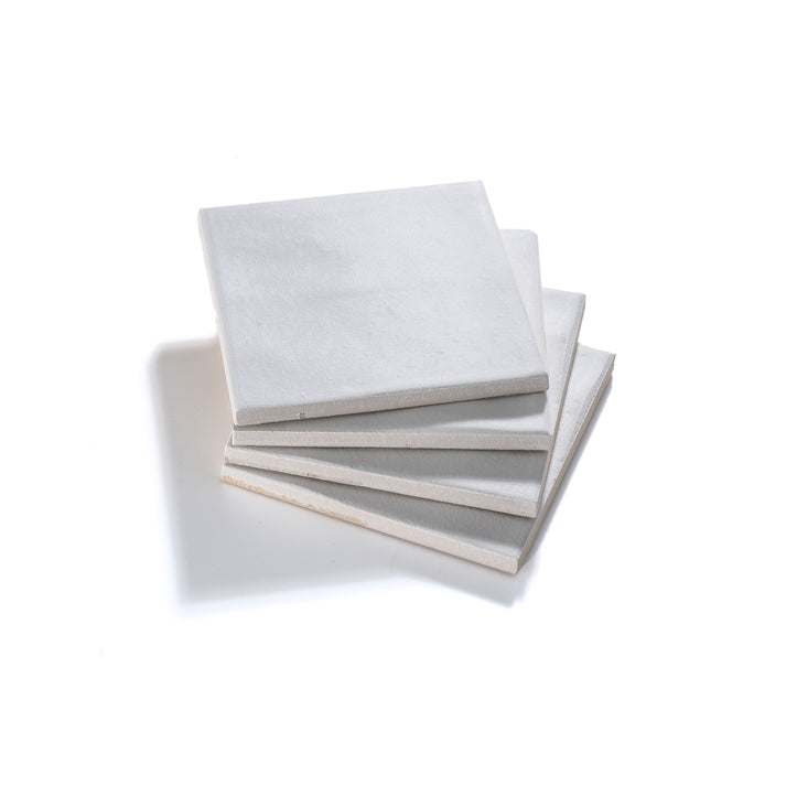 White ceramic floor tile with polished finish