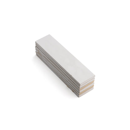 Matte white ceramic tile in subway pattern