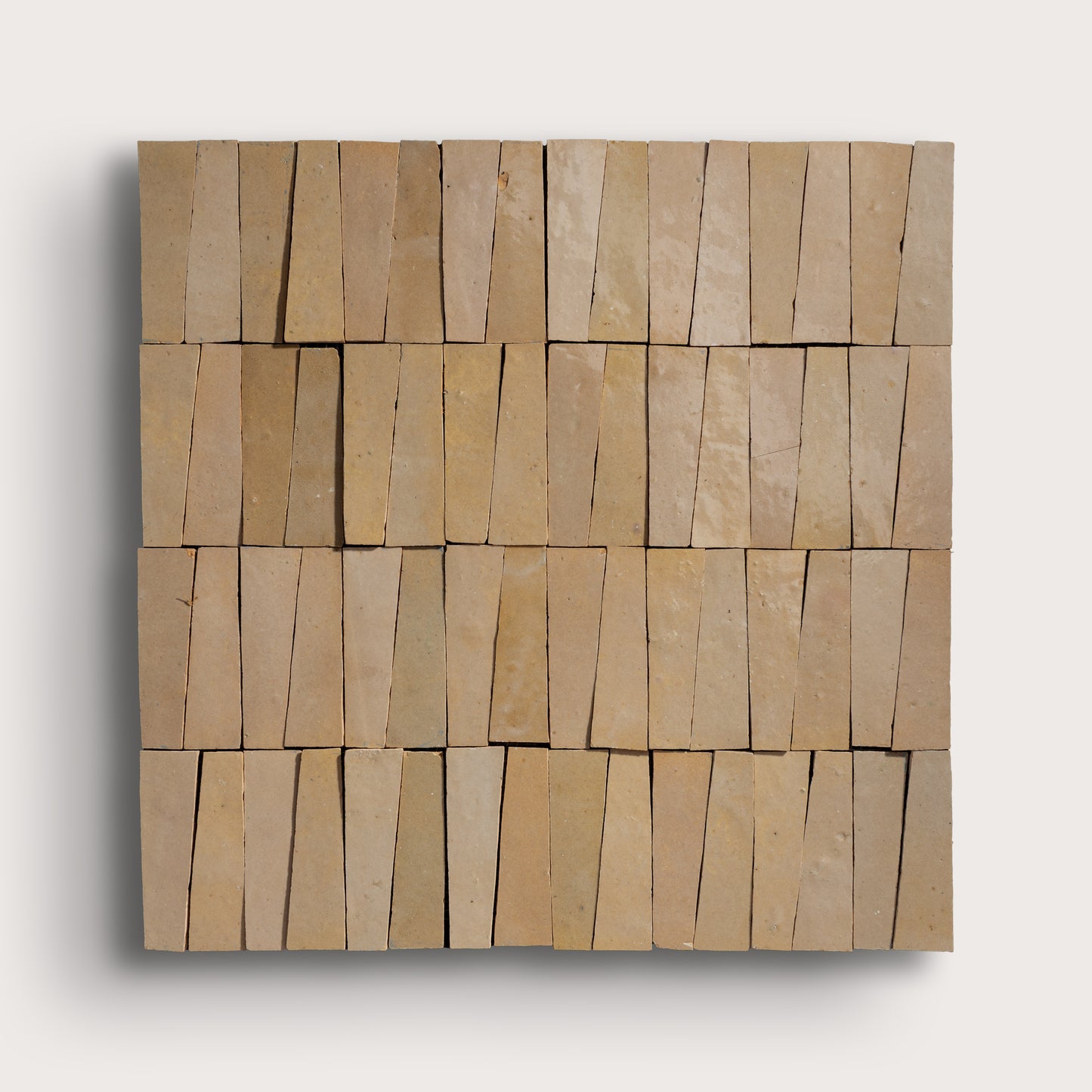 Square arrangement of zellige tile on a white background