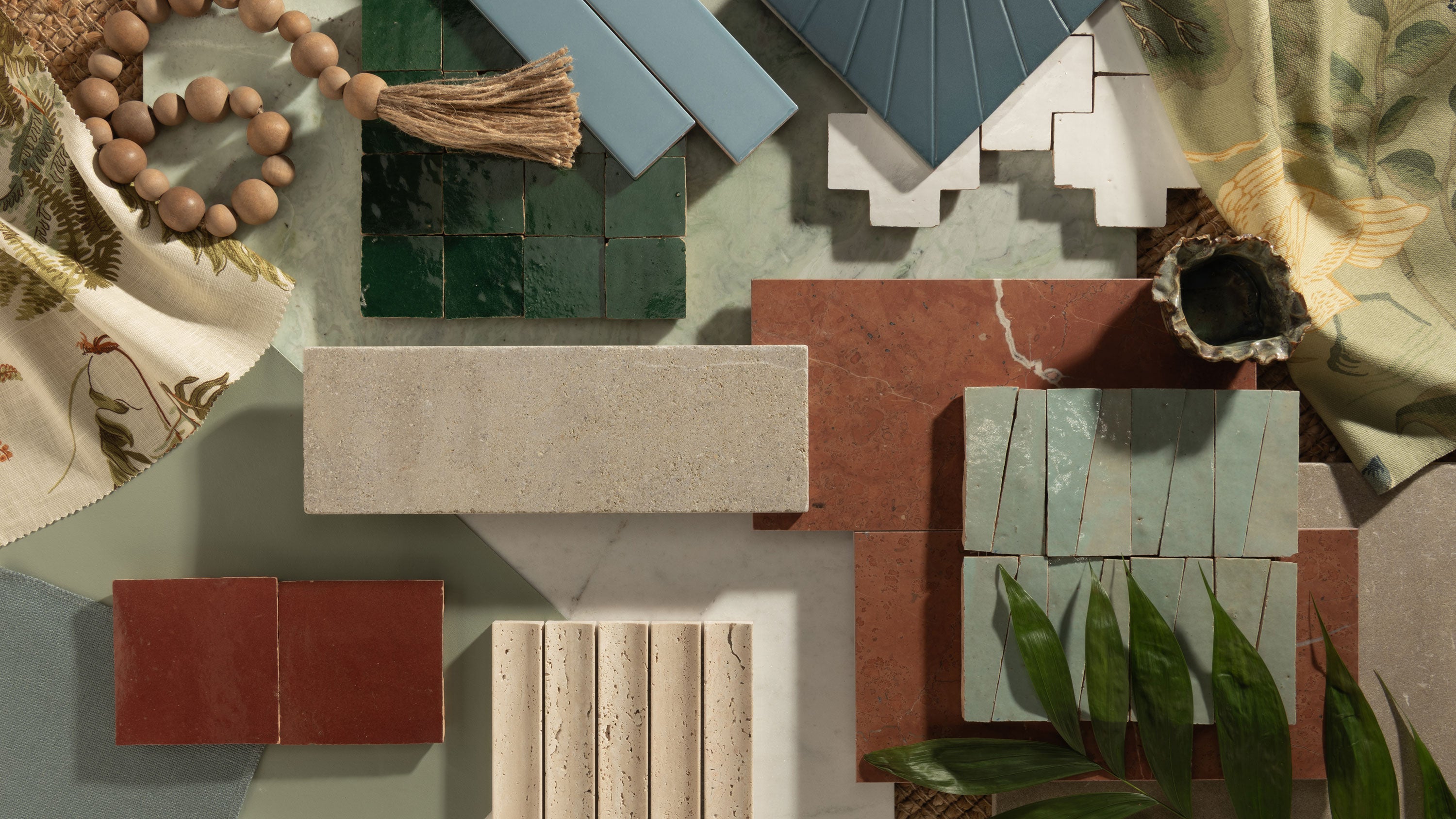zellige, limestone, marble, and travertine tile in different colors arranged in a mood board