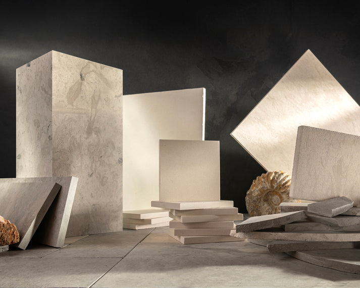 Collection of limestone samples on a dark background