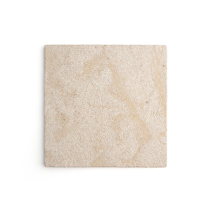 A square beige textured tile or stone sample with subtle natural marbling, shown against a plain white background.