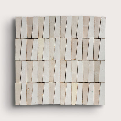 white trapezoid zellige tile on a light gray background