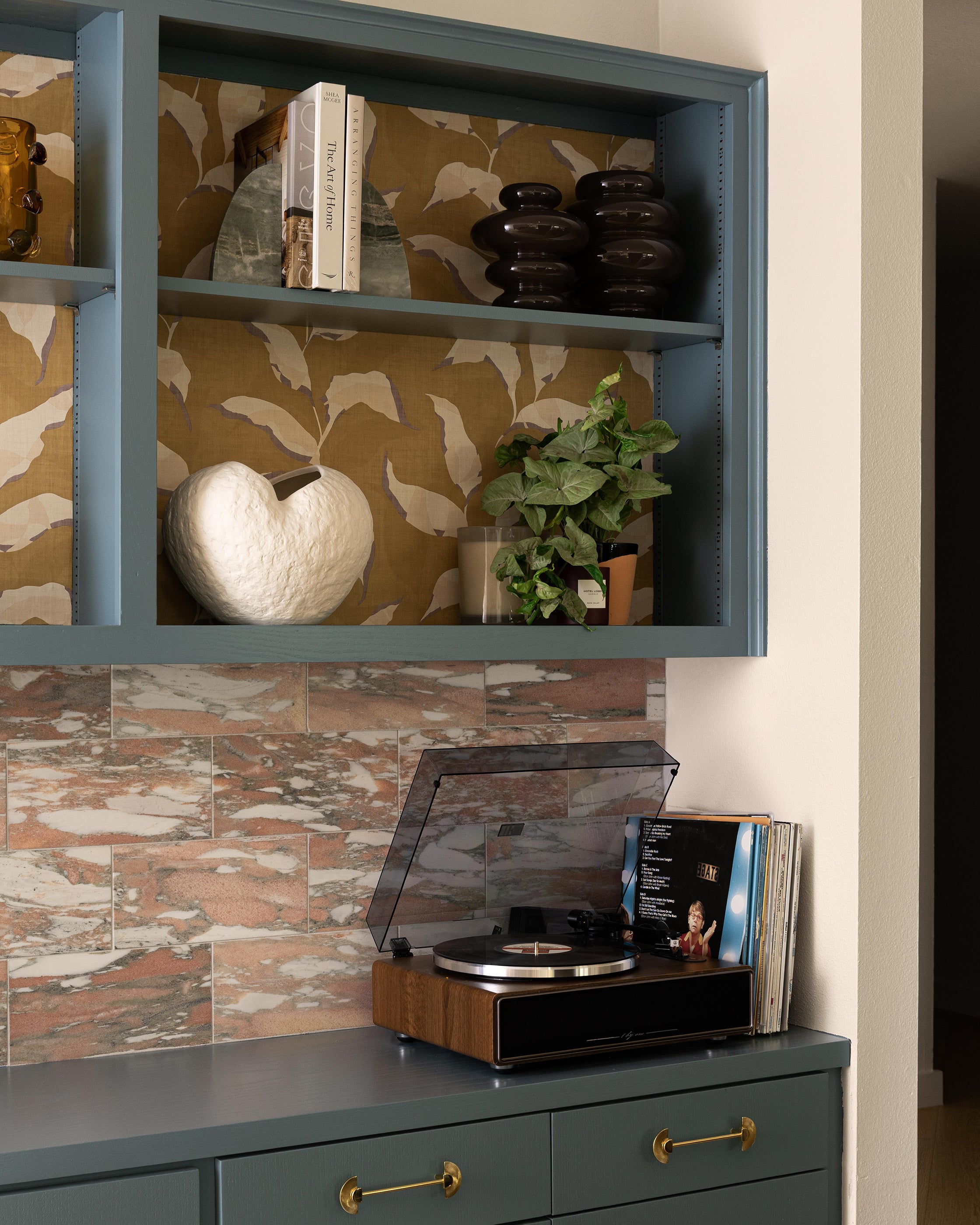 Norwegian Rose 6x12 Marble Tile | Honed - close up installed as backsplash in living room built in shelving unit-Riad Tile