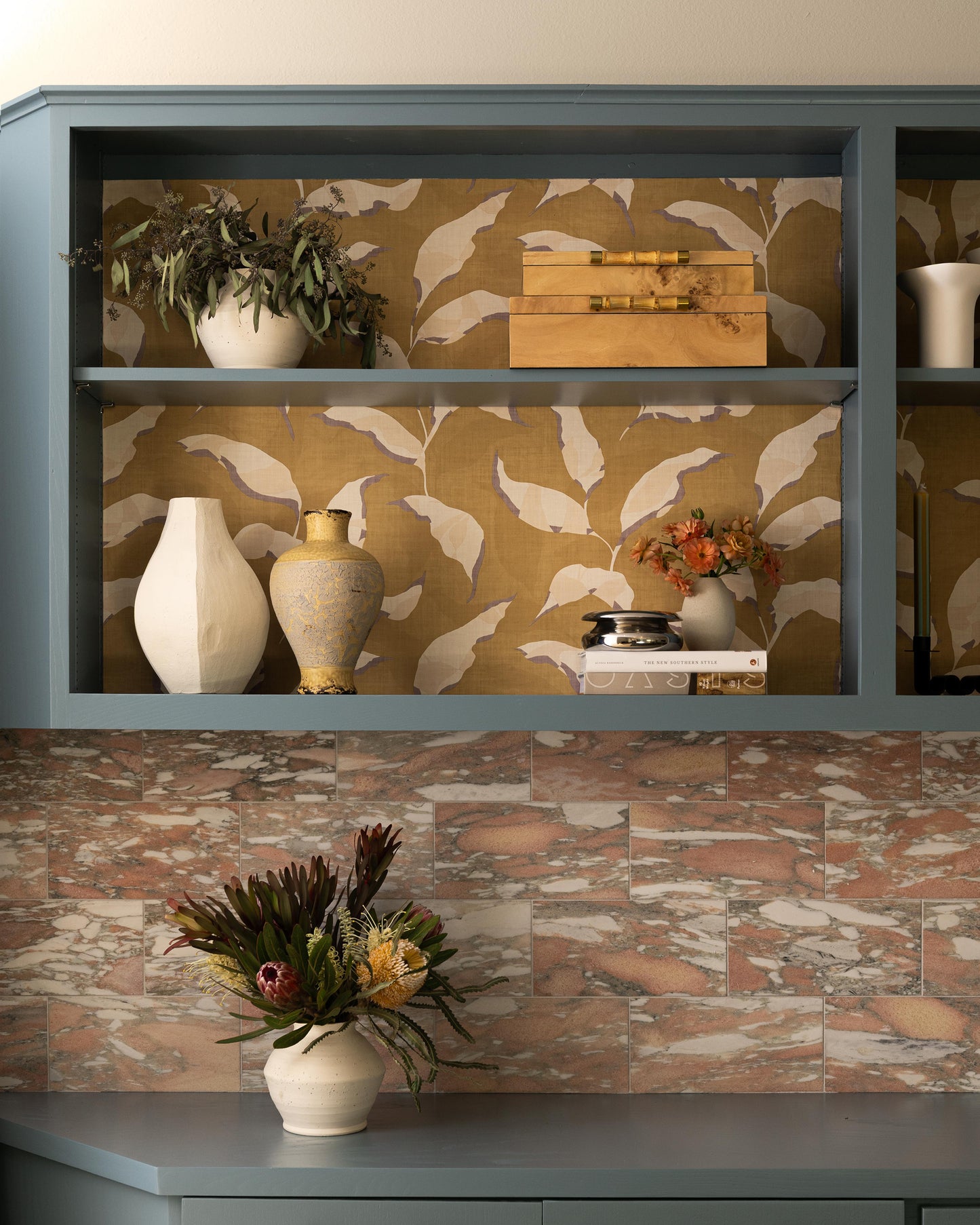Norwegian Rose 6x12 Marble Tile | Honed -installed as backsplash in living room built in shelving unit with decoartive objects-Riad Tile