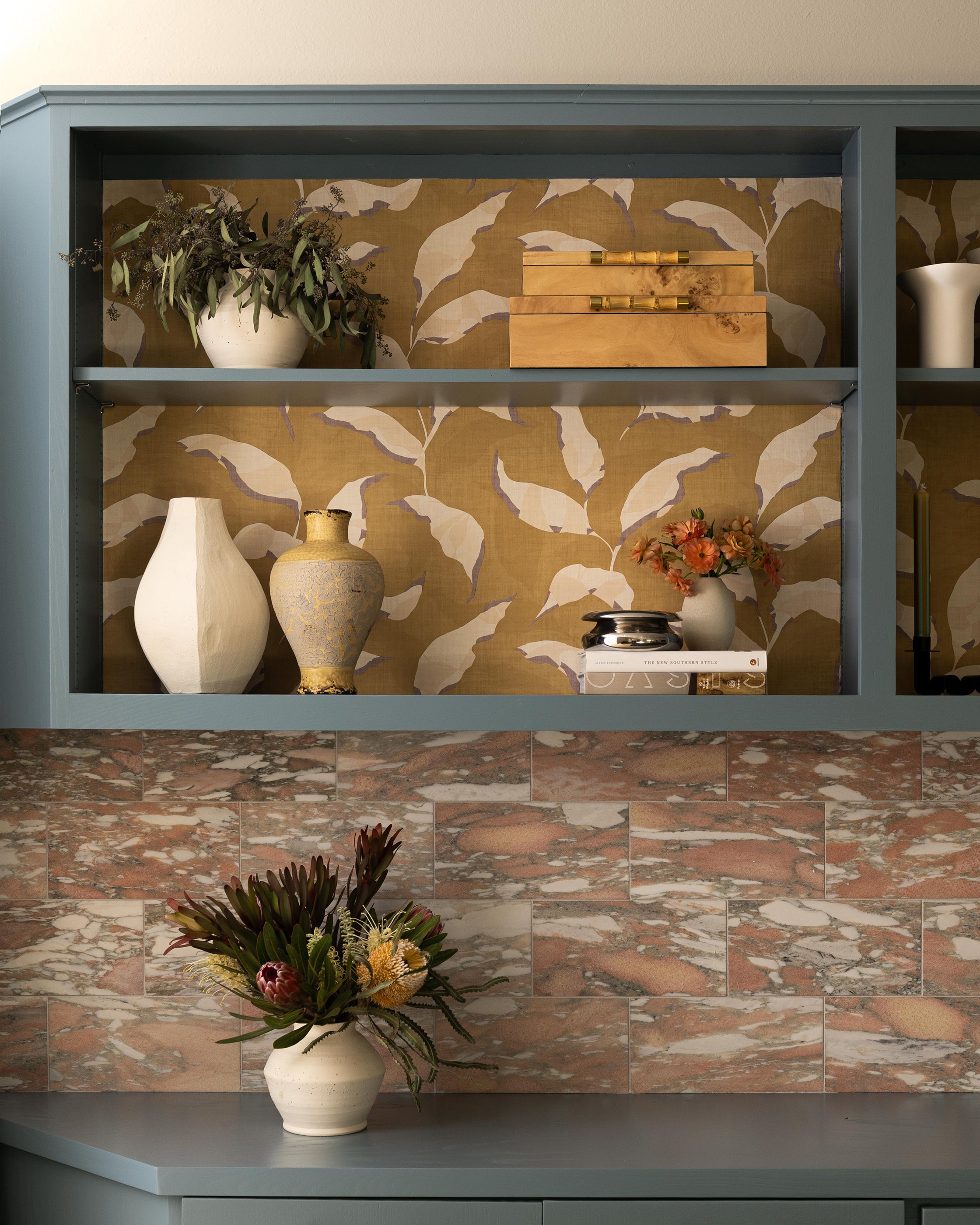 Norwegian Rose 6x12 Marble Tile | Honed -installed as backsplash in living room built in shelving unit with decoartive objects-Riad Tile