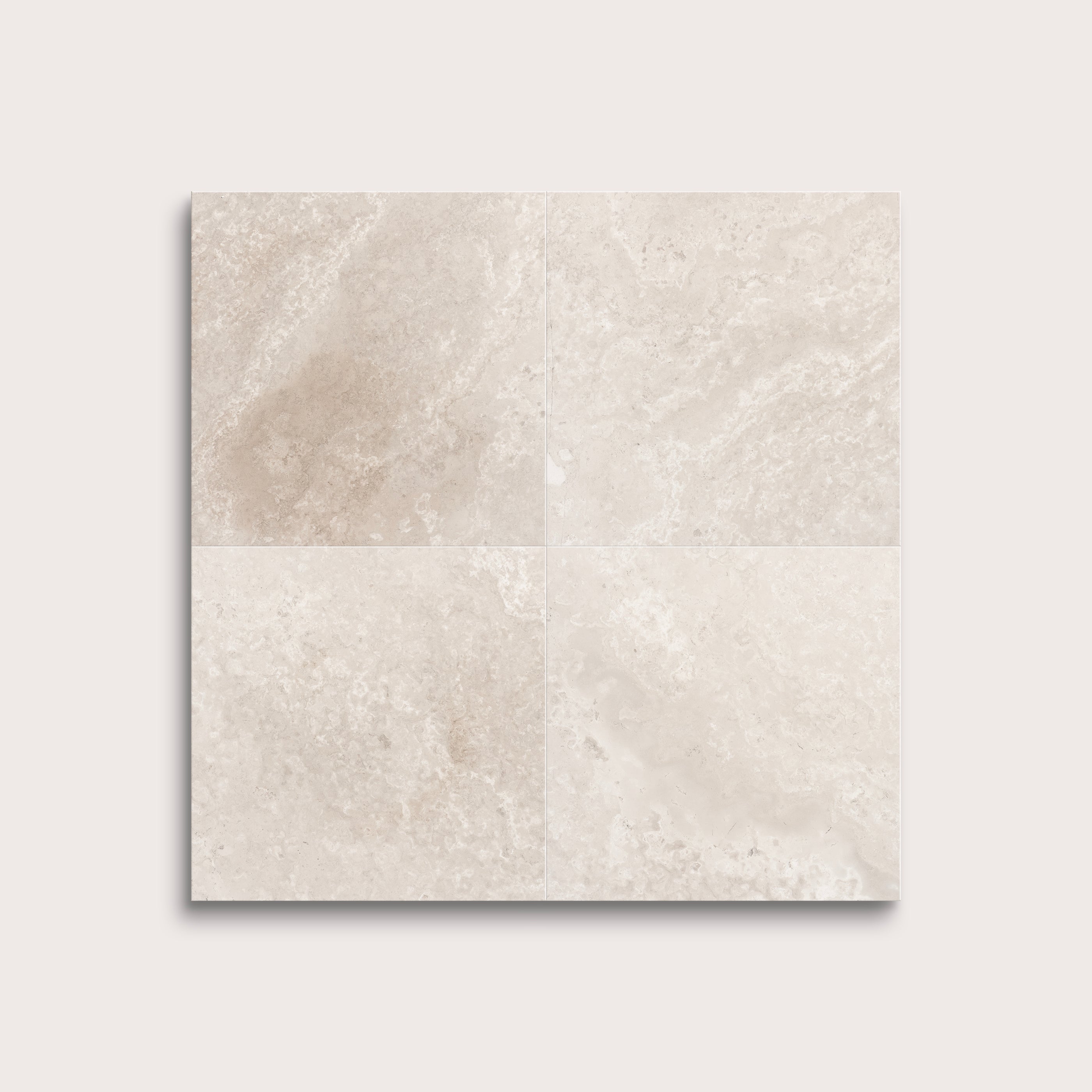 Beige limestone tile on a light gray background