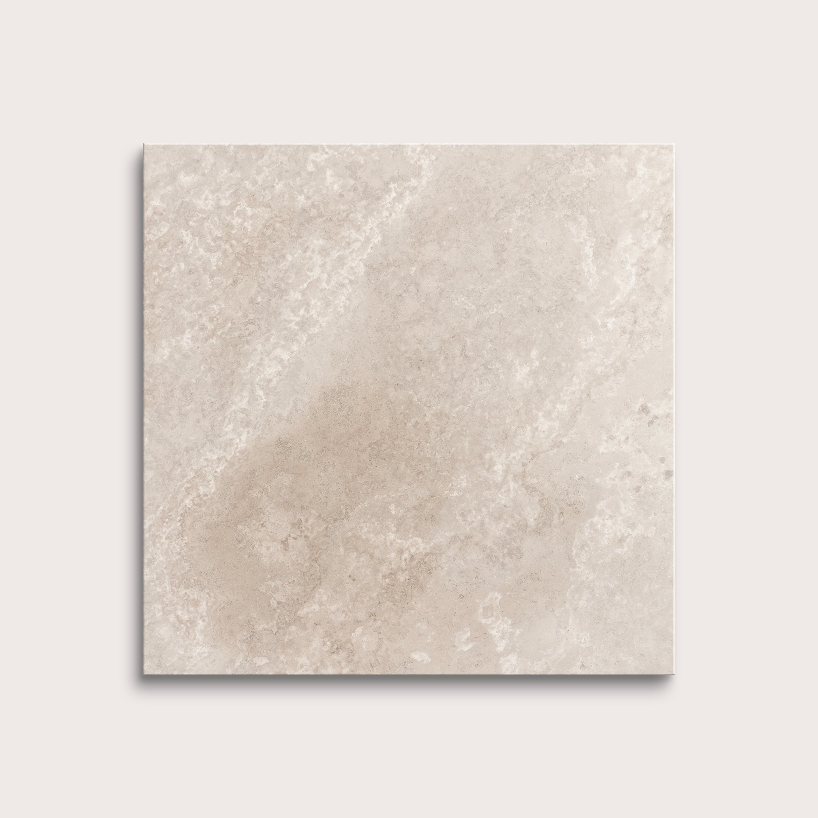 Beige limestone tile on a light gray background