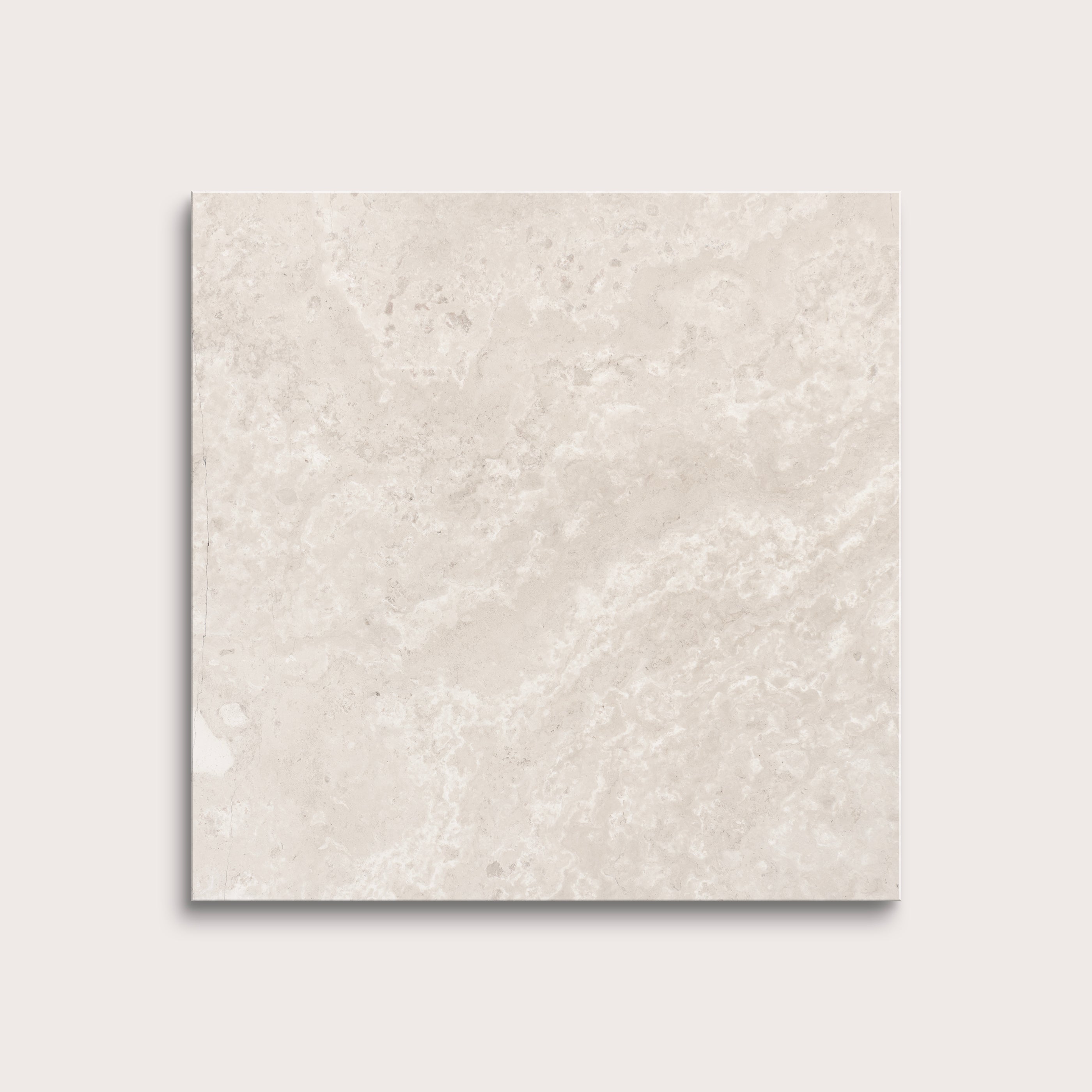 Beige limestone tile on a light gray background