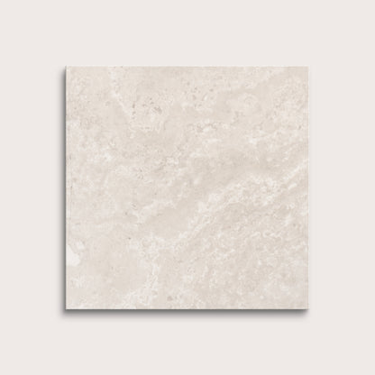Beige limestone tile on a light gray background