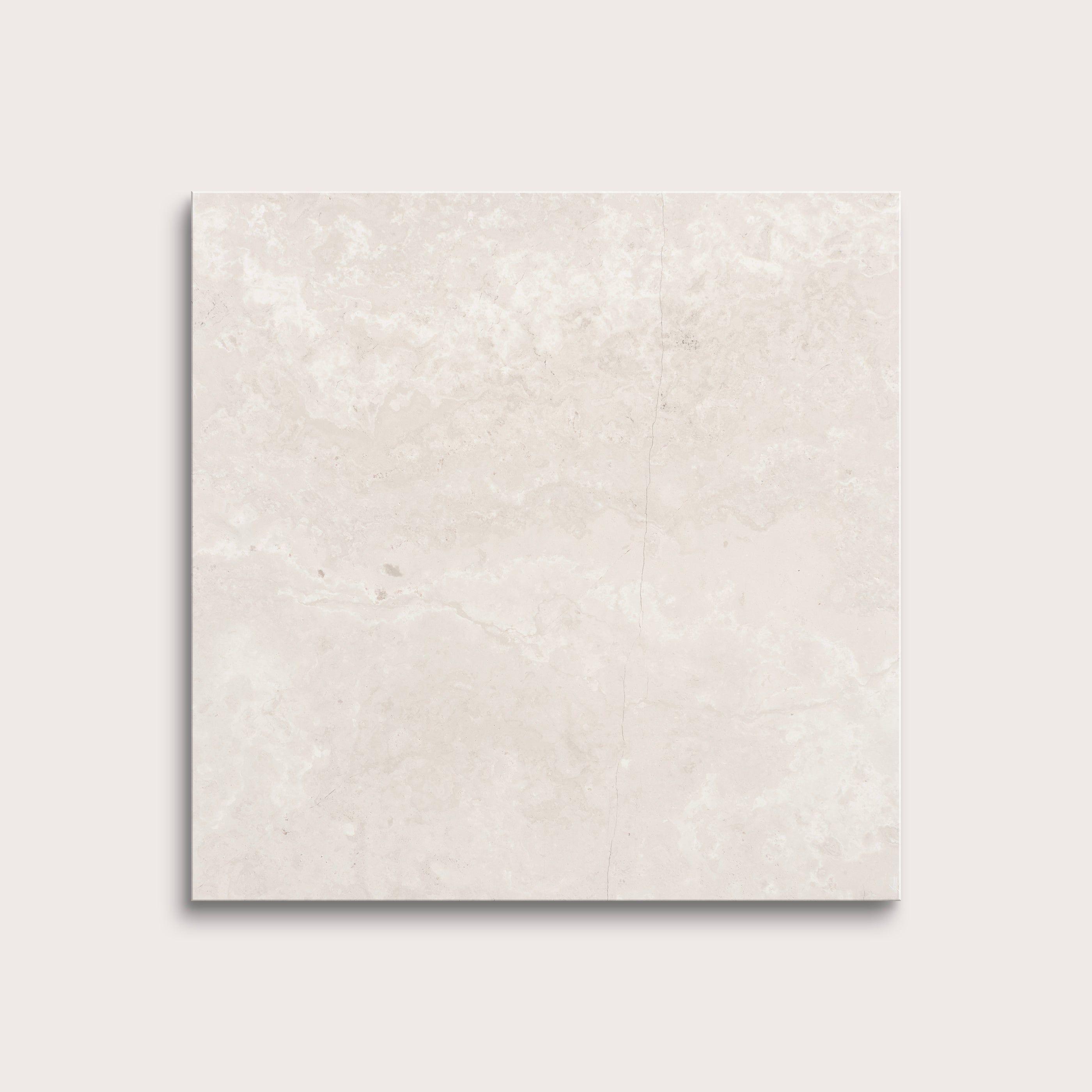 Beige limestone tile on a light gray background