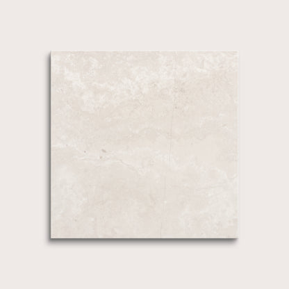 Beige limestone tile on a light gray background