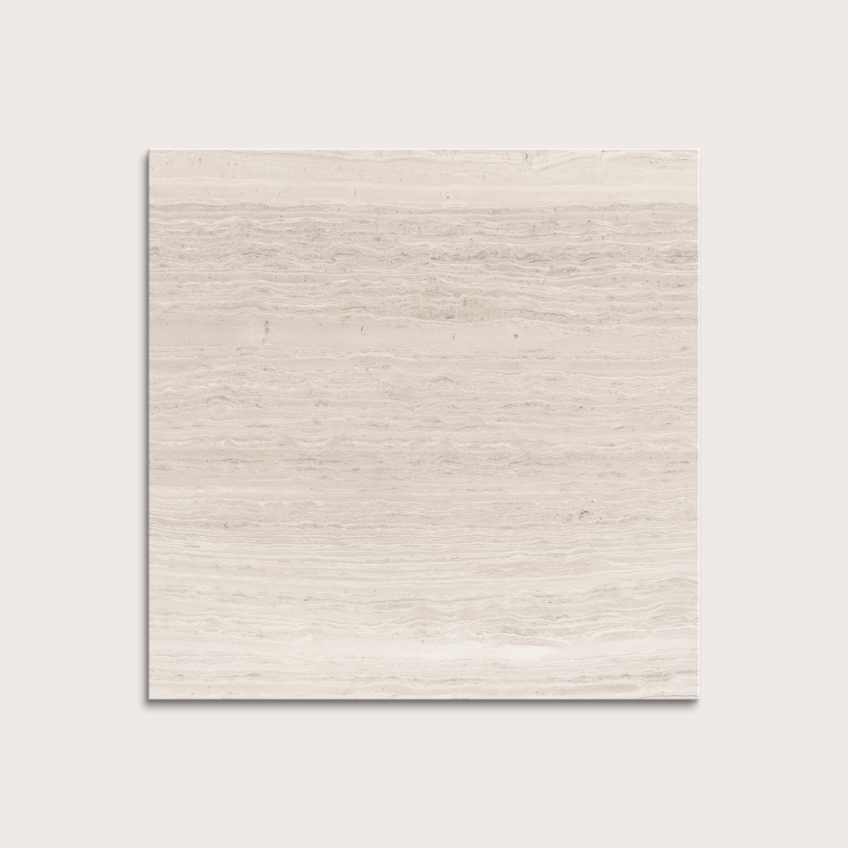 Beige limestone tile on a light gray background