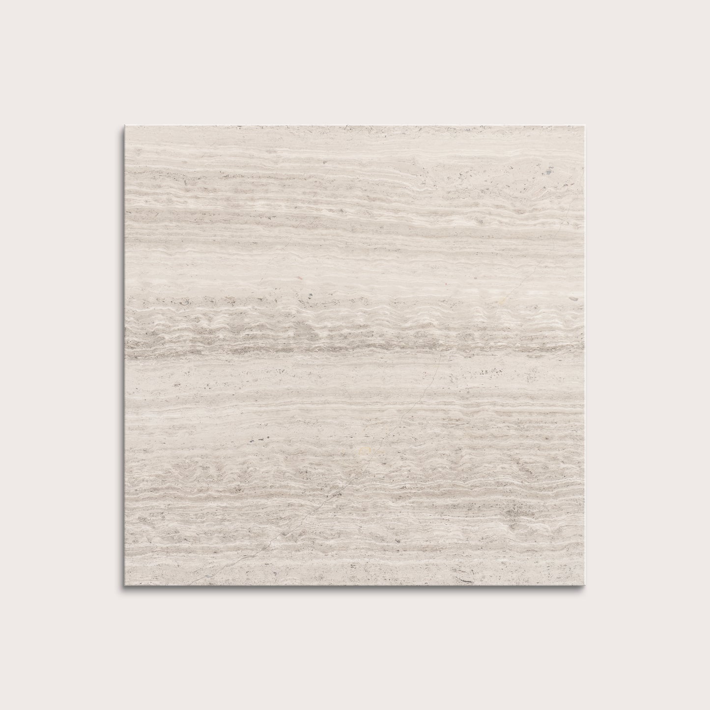 Beige limestone tile on a light gray background