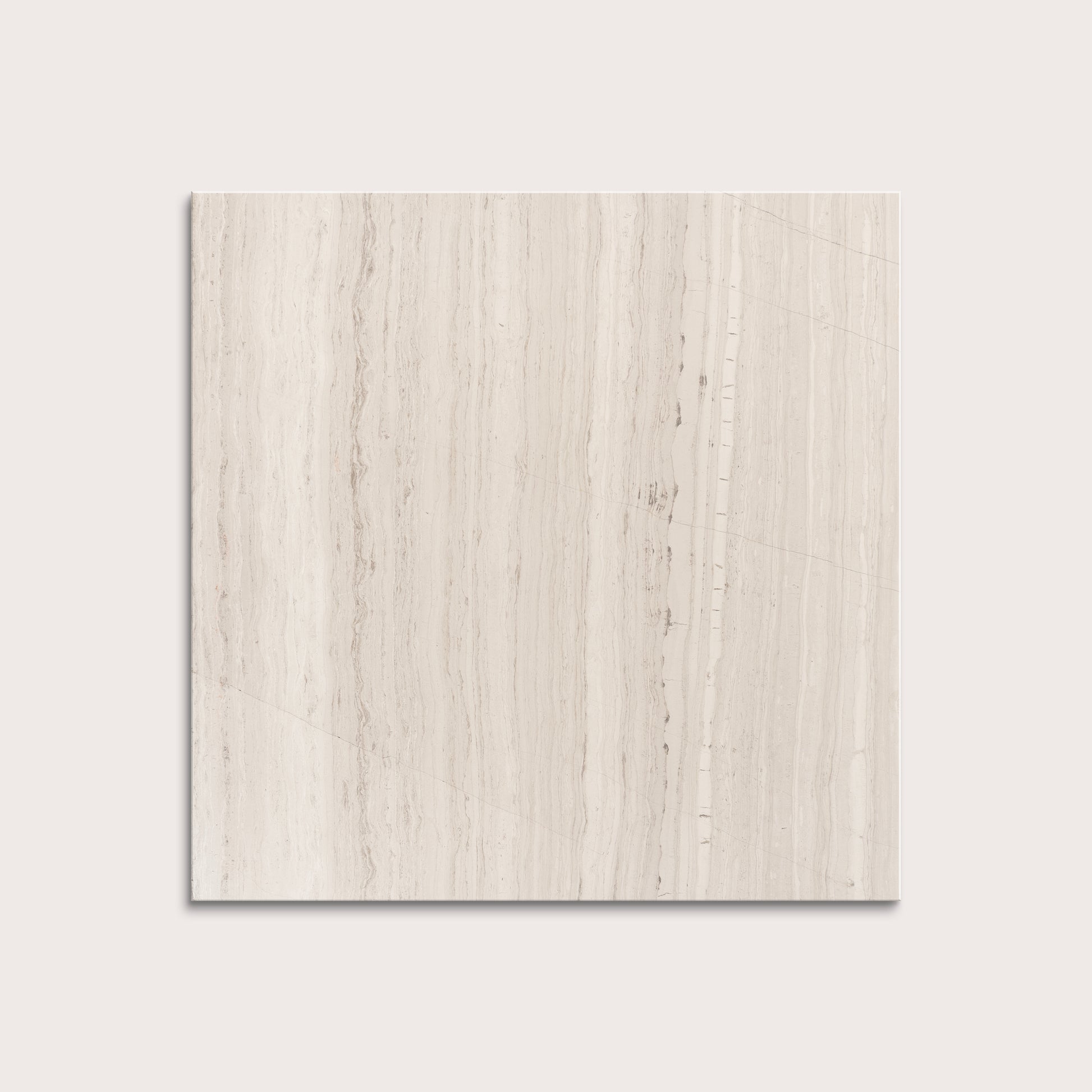 Beige limestone tile on a light gray background