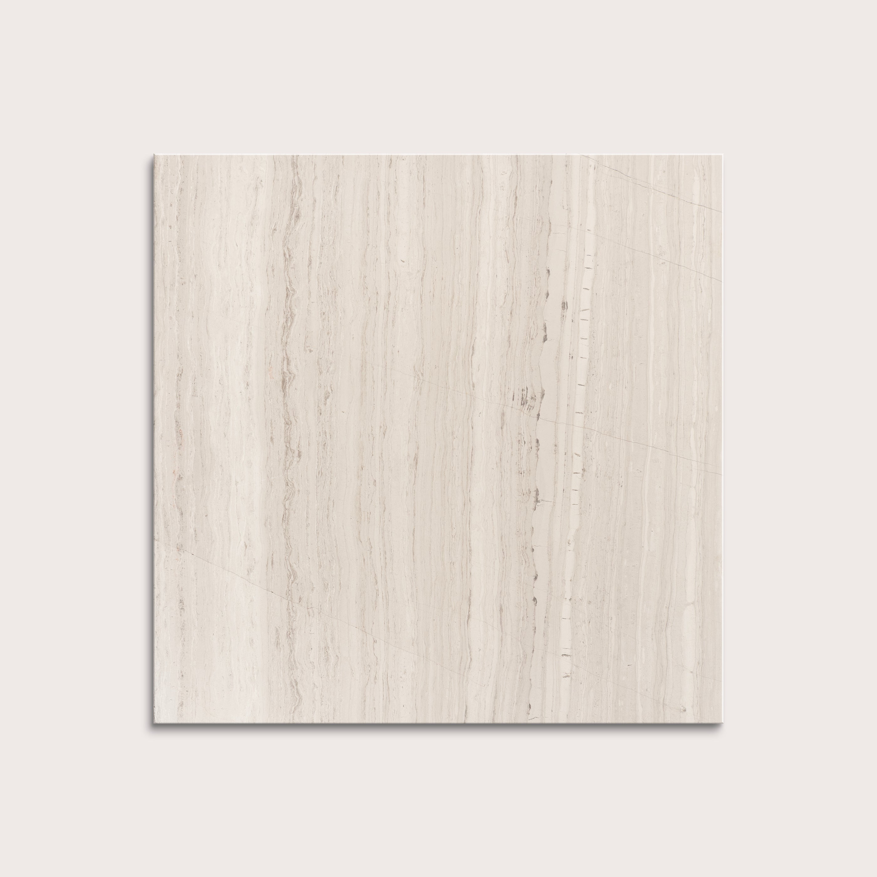 Beige limestone tile on a light gray background