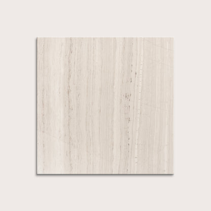 Beige limestone tile on a light gray background
