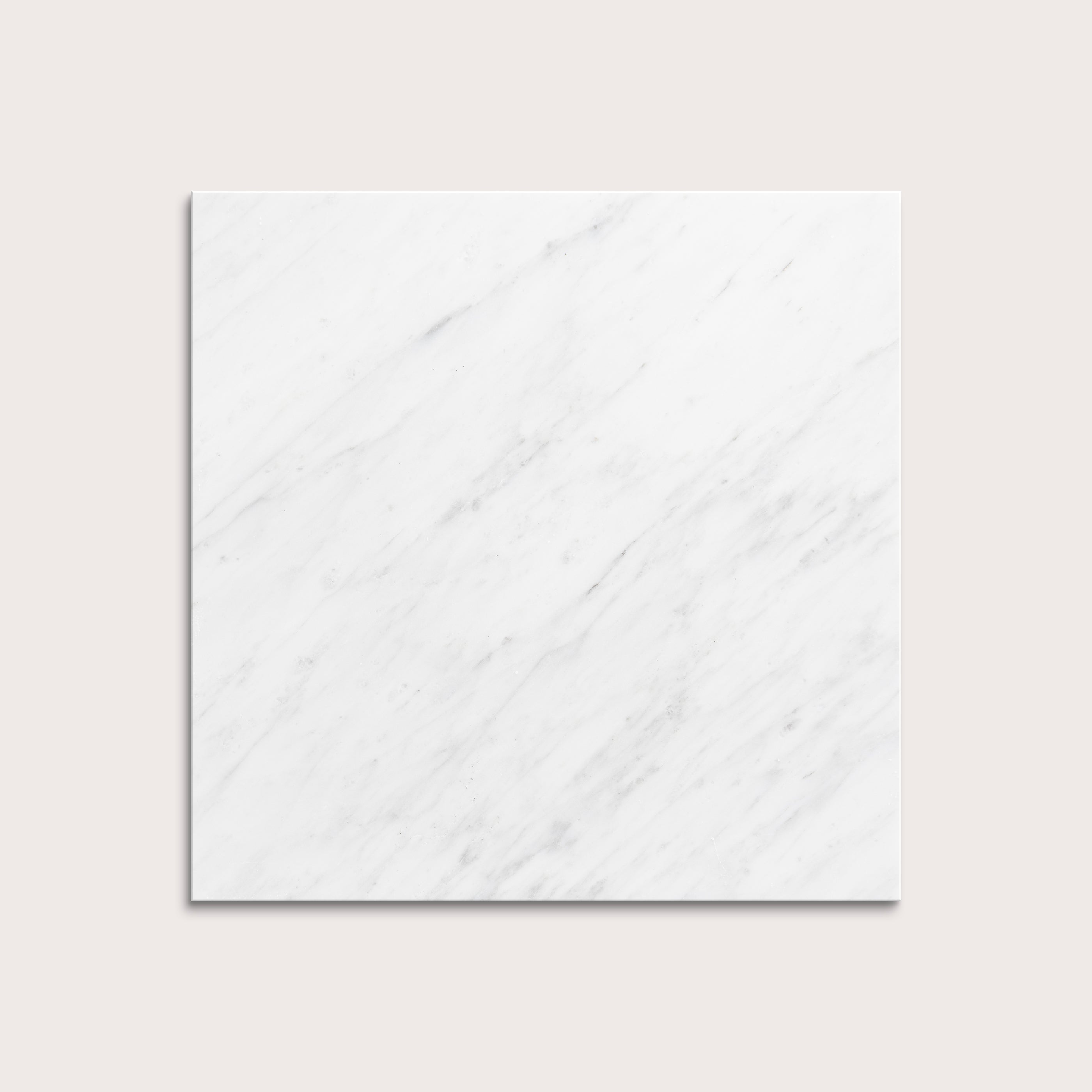 White casablanca carrara marble tiles on a light gray background
