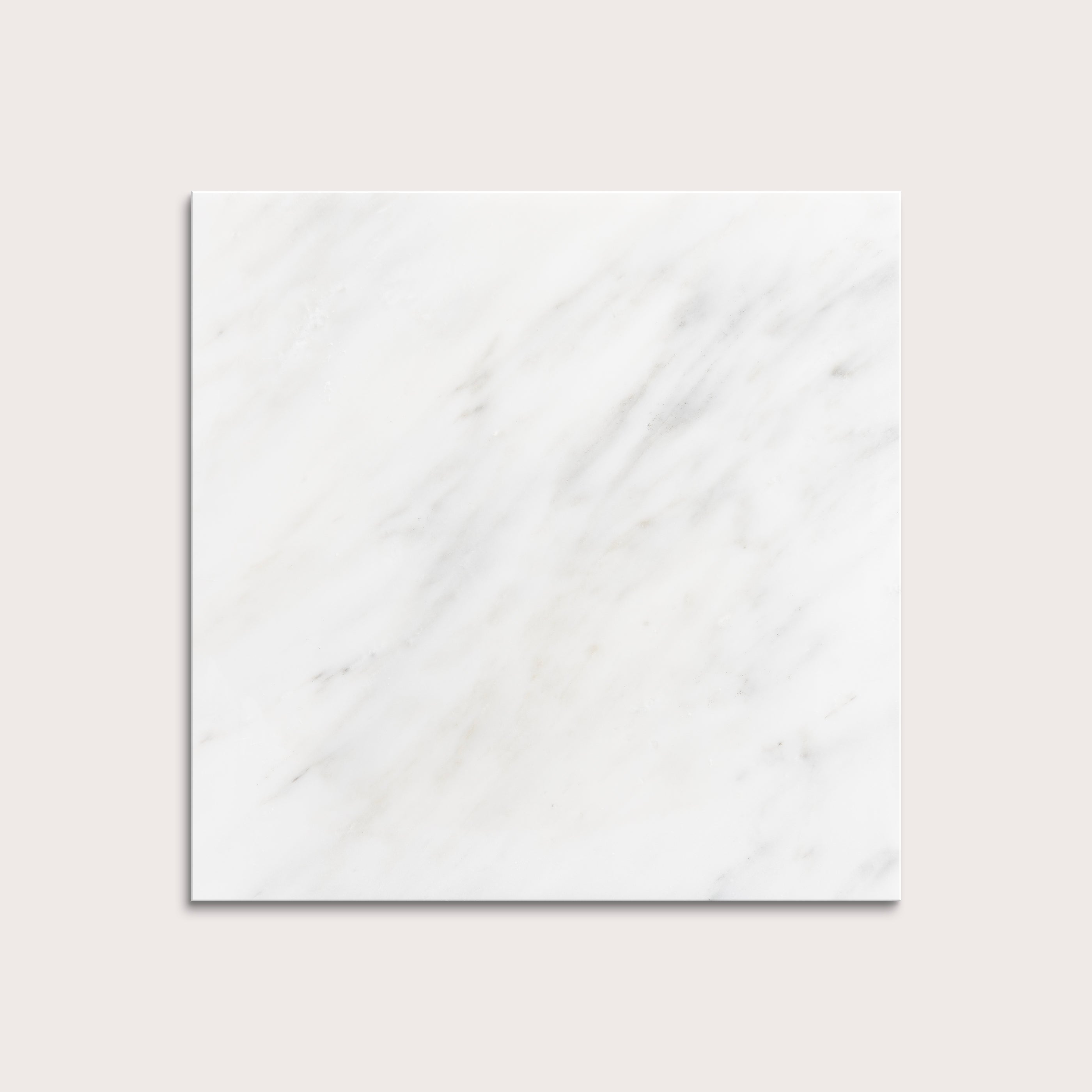 White casablanca carrara marble tiles on a light gray background