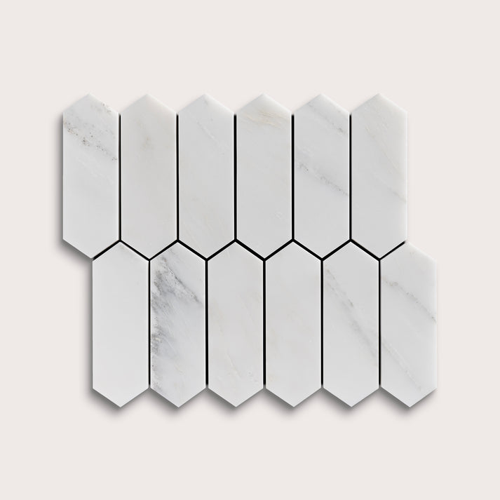 Hexagonal casablanca carrara marble mosaic tile on a light gray background