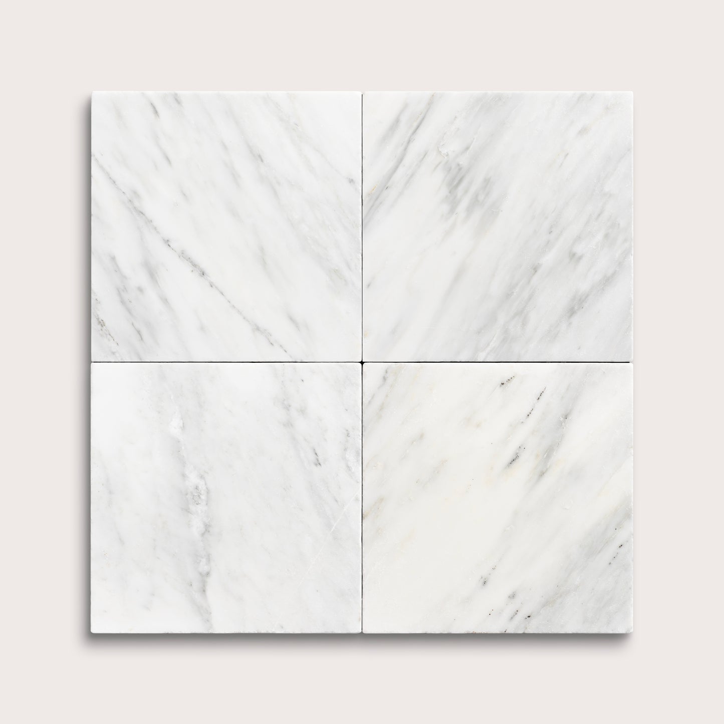 White casablanca carrara marble tiles in a grid pattern on a light gray background