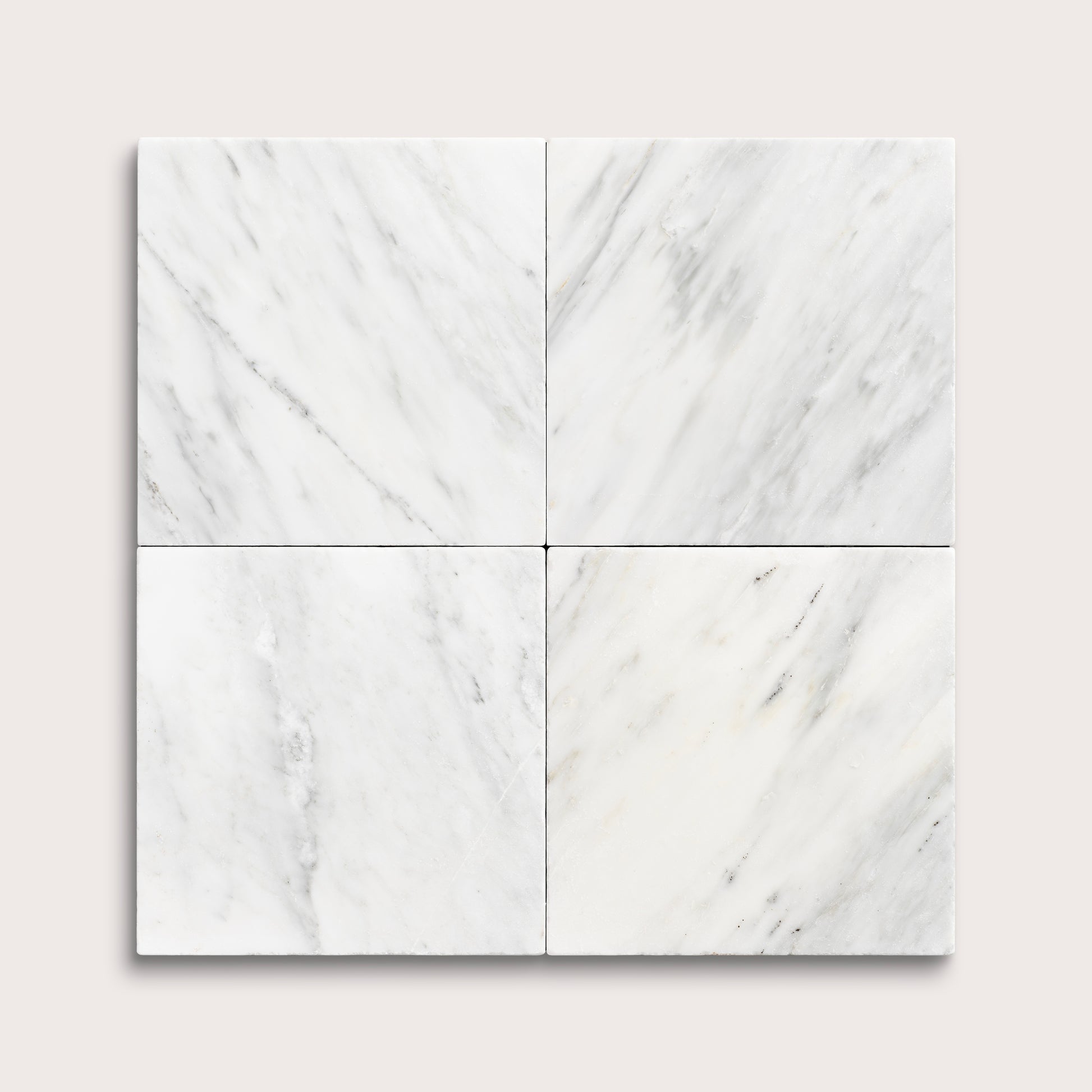 White casablanca carrara marble tiles in a grid pattern on a light gray background