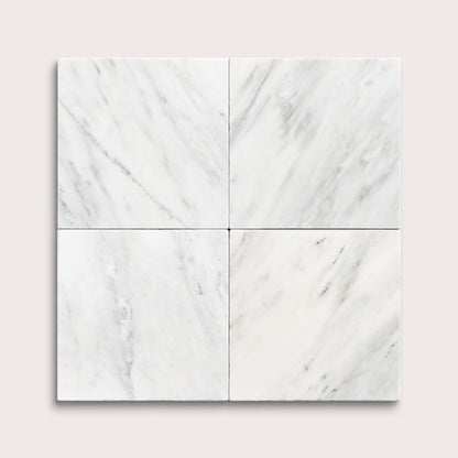 White casablanca carrara marble tiles in a grid pattern on a light gray background