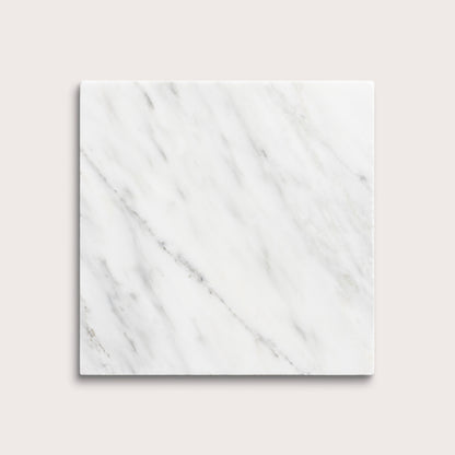 White casablanca carrara marble tiles on a light gray background