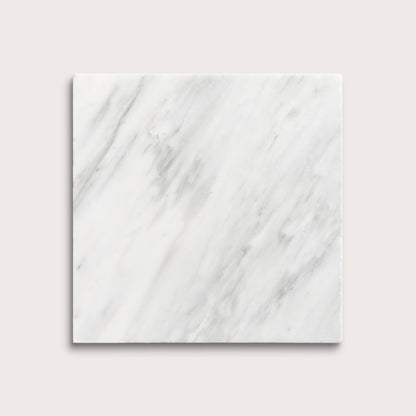 White casablanca carrara marble tiles on a light gray background