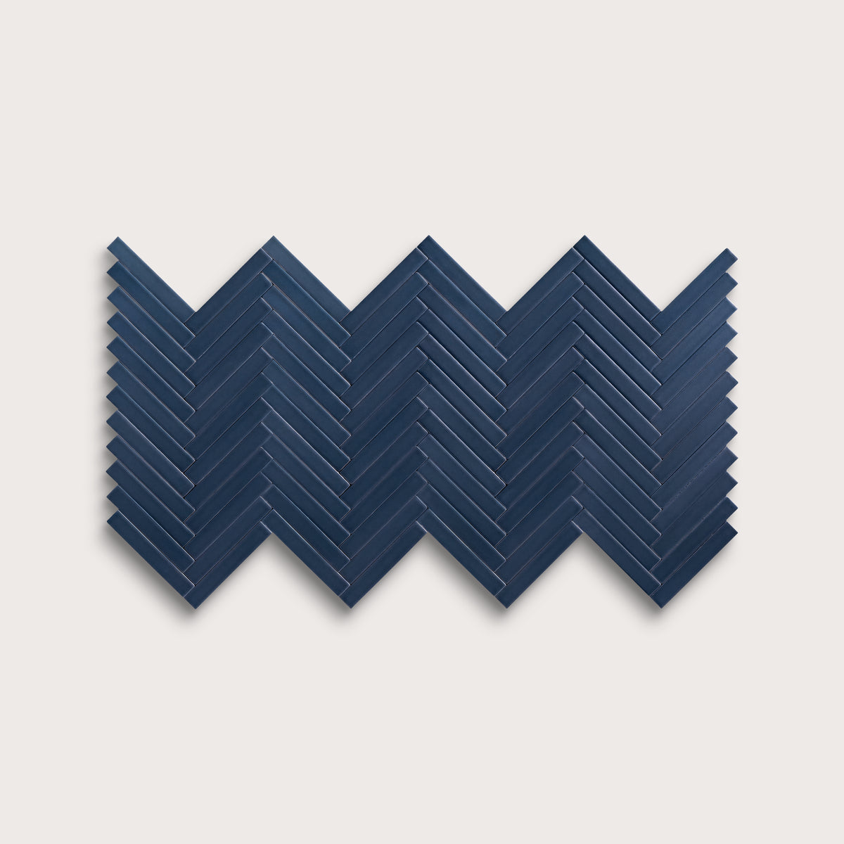 Abyss ceramic tile, 1 by 6 inch herringbone mosaic, matte finish