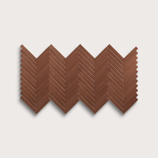 Amber ceramic tile, 1 by 6 inch herringbone mosaic, matte finish