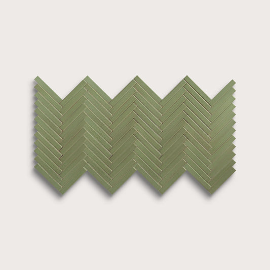 Cactus Green ceramic tile, 1 by 6 inch herringbone mosaic, matte finish