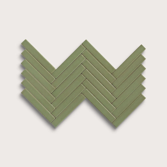Cactus Green ceramic tile, 1 by 6 inch herringbone mosaic, matte finish
