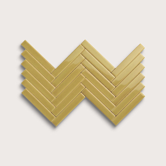 Citron ceramic tile, 1 by 6 inch herringbone mosaic, gloss finish