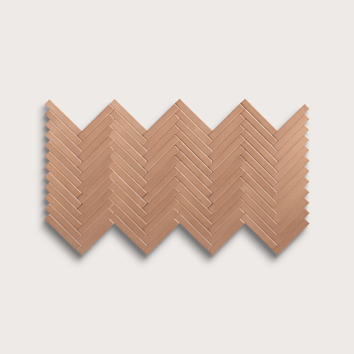Clay ceramic tile, 1 by 6 inch herringbone mosaic, matte finish