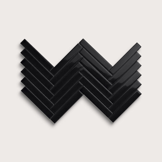 Deep Black ceramic tile, 1 by 6 inch herringbone mosaic, gloss finish