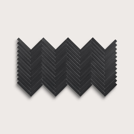 Deep Black ceramic tile, 1 by 6 inch herringbone mosaic, matte finish